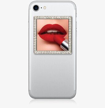 Bild av stilren smartphone med glamorös spegeldekor