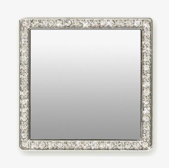 Bild av fyrkantig spegel med glittrande kristaller