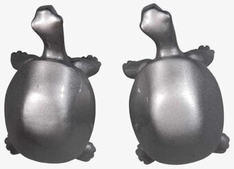 Bild på stilrena sköldpaddformade knoppar i silver