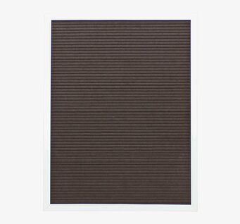 Bild av stilren och mångsidig bokstavstavla i hemmet