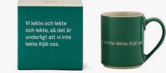 Bild på mugg med citat och elegant förpackning