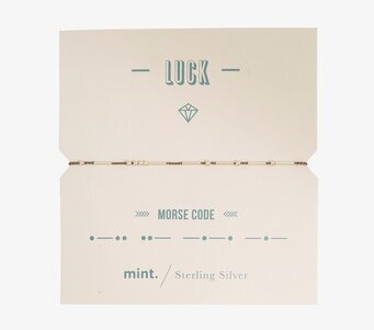 Bild av armband med Morse-kod och elegant design