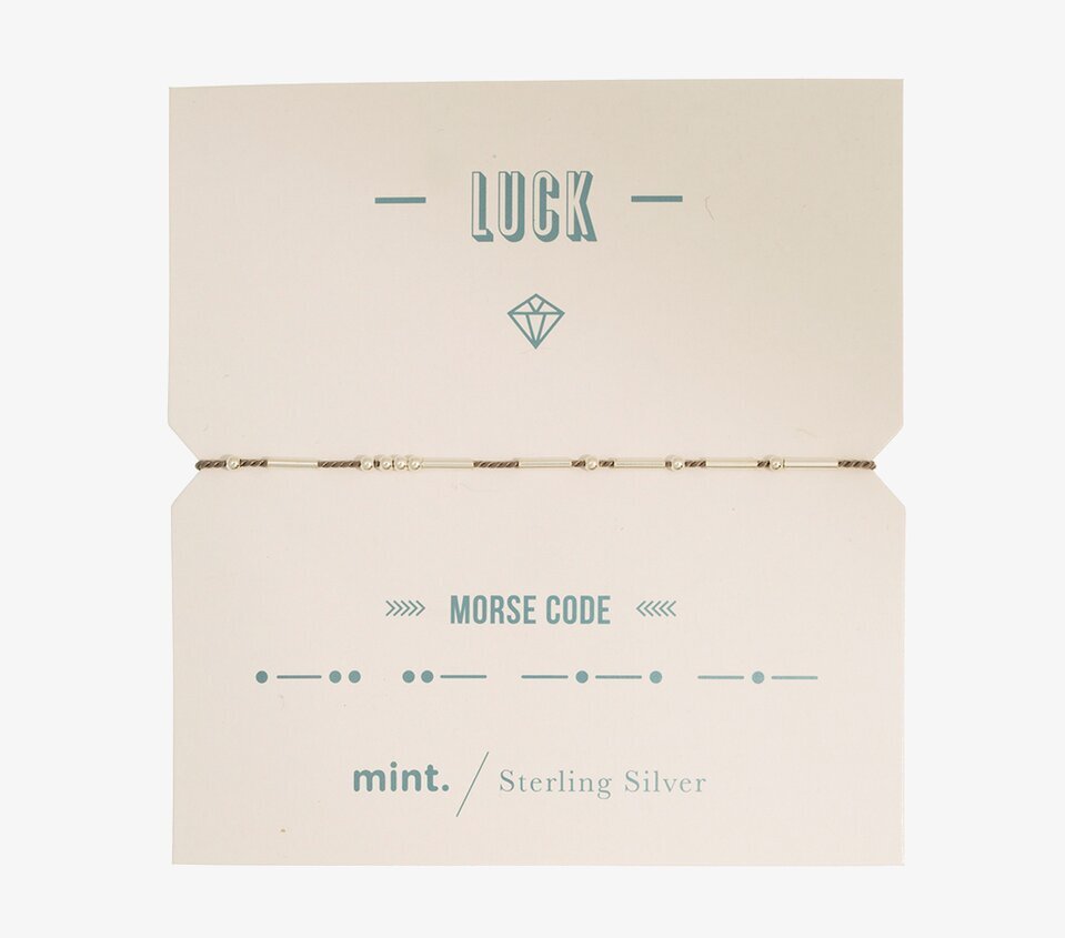 Bild av armband med Morse-kod och elegant design