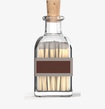 Bild av elegant glasbehållare med tändstickor