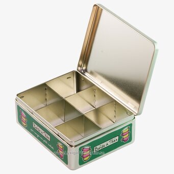 Bild av stilren och funktionell plåtburk för tepåsar