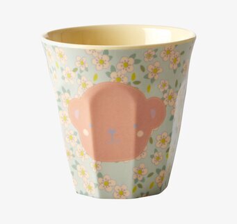 Bild av charmig barnmugg med apa och blommönster
