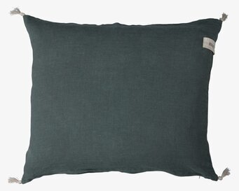 Bild av stilrent kuddfodral med tofsar i grönt linne