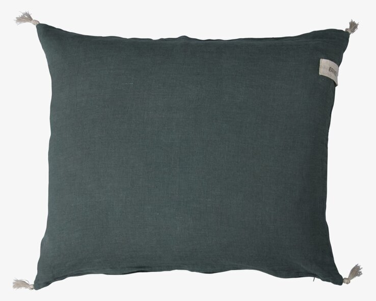 Bild av stilrent kuddfodral med tofsar i grönt linne
