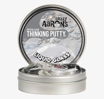 Bild av genomskinlig lera i metallburk med lock öppet