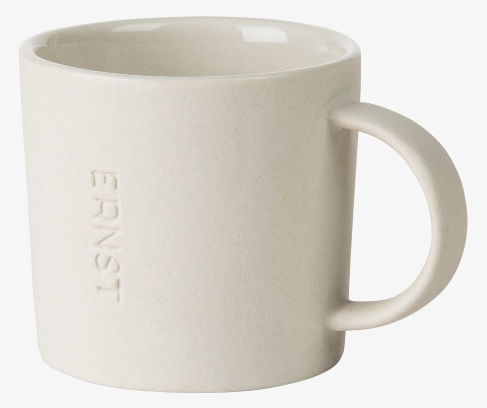 Bild av stilren och funktionell vit mugg med handtag