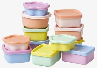 Bild av färgglada staplade plastburkar för hemmet