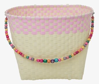 Bild av cykelkorg i pastellfärger med pärldetaljer