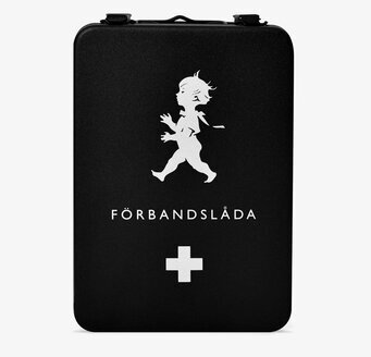 Bild av stilrent svart medicinskåp med vit design