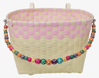 Foto av livfull pastellgul cykelkorg med dekorer