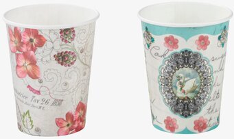 Bild av eleganta pappersmuggar med blommor och svanmotiv