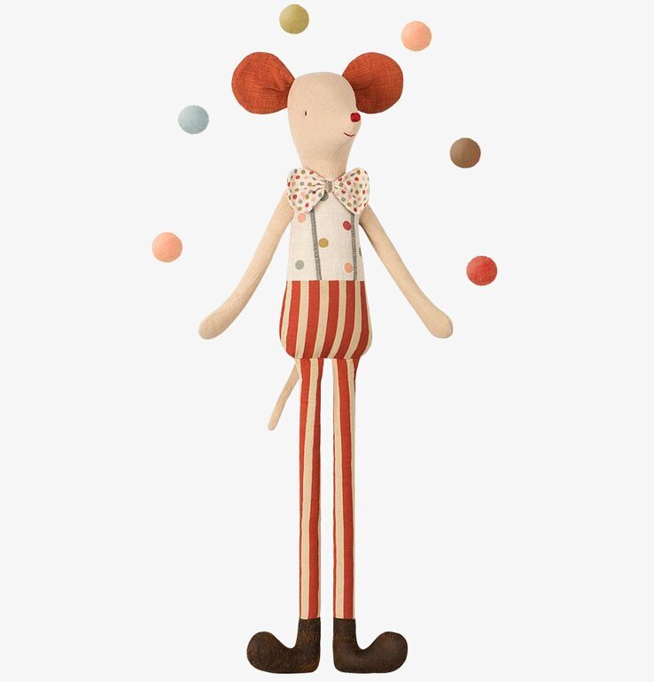 Foto av charmig musleksak med cirkustema och stiltoner