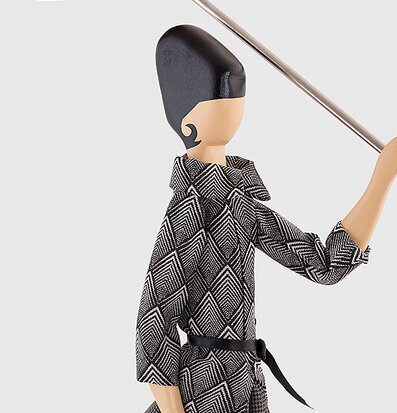 Bild av unik och konstnärlig bordslampa med figurdesign