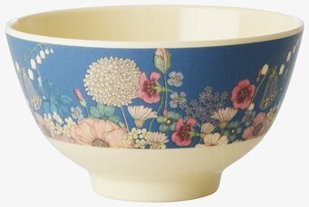 Bild av vacker skål med blommönster och krämvit insida