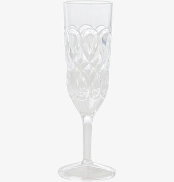 Foto av ett elegant champagneglas med mönstrad yta