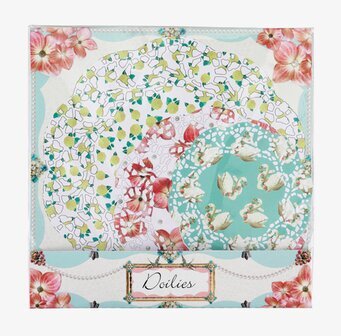 Bild av dekorativa tårtpapper med blommor och svanar