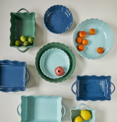 Bild av färgglada pajformar med frukt och grönsaker