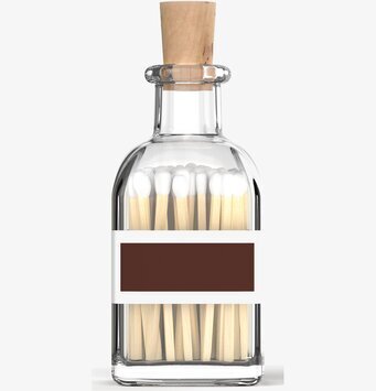 Bild av stilren glasflaska med tändstickor