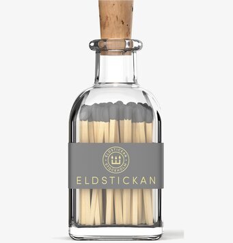 Bild av elegant glasburk med tändstickor i hemmet