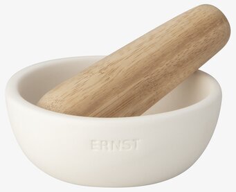 Bild av stilren mortel i stengods med trähantverk