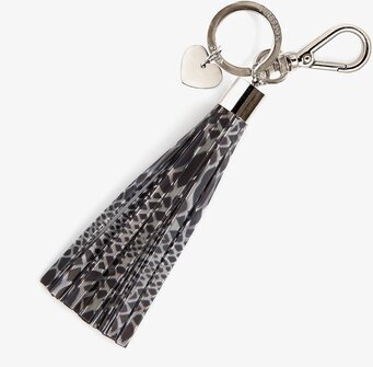 Bild av nyckelring med reflextofs och ormmönster
