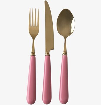 Bild av stilfulla mässingsbestick med rosa handtag