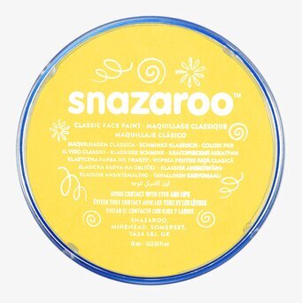 Bild av gul ansiktsfärg i kompakt förpackning