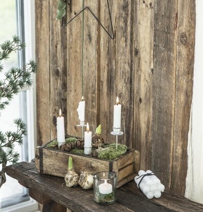 Bild av rustik inredning med ljus och naturliga element