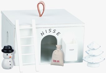 Bild av charmigt nissehus med juldekorationer