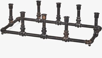 Foto av en industriell ljusstake med vintage-design