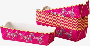 Bild av livfulla bakformar med blom- och prickmönster