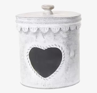 Bild av stor burk med rustik finish och dekorativ design