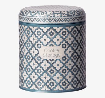 Bild av dekorativ plåtburk för kakförvaring i blått