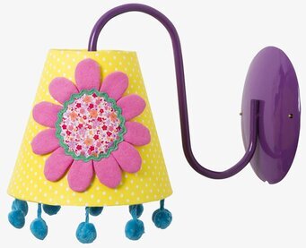 Bild på färgglad vägglampa med blomdesign och prickar