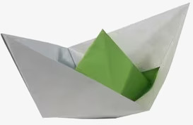 Bild av en elegant origamibåt i vitt och grönt papper