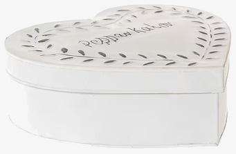 Bild av hjärtformad burk med mönster och text Pepparkakor