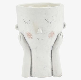 Bild av vit blomkruka med ansiktsdesign och charm