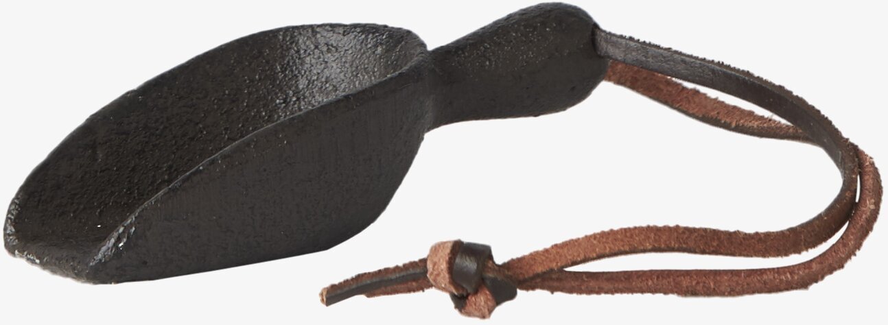 Foto av stilren och funktionell köksskopa i metall