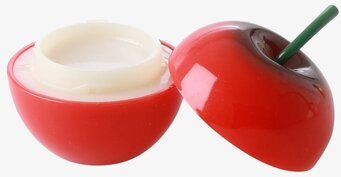 Foto av äppelformad läppbalsamförpackning i rött