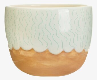 Bild av elegant kruka med jordnära och mjuka toner