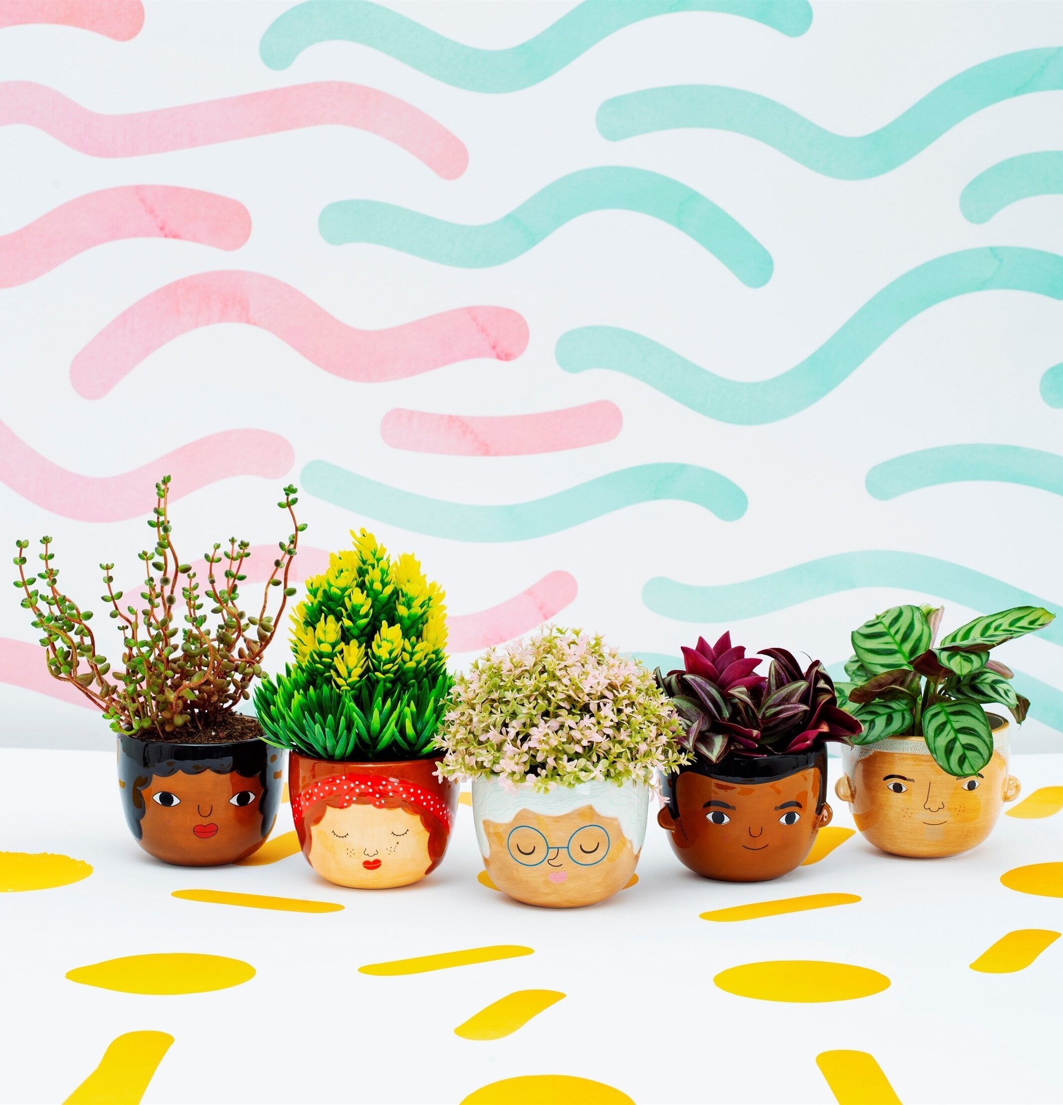 Kruka Mini Rose från Sass & Belle med lekfulla ansikten