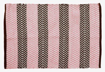 Bild av en elegant matta med rosa och bruna mönster