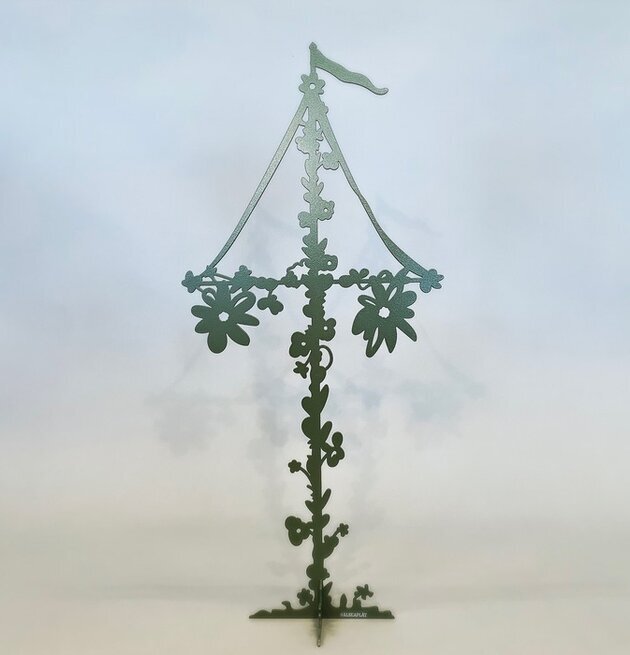 Bild av dekorativ grön midsommarstång i metall