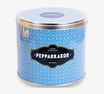 Bild av elegant blå burk med pepparkakor och mönster