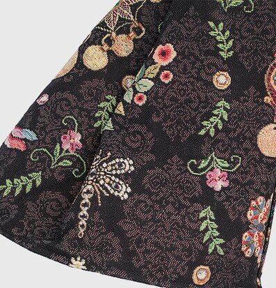 Bild av detaljrik textilskärm med livfullt mönster