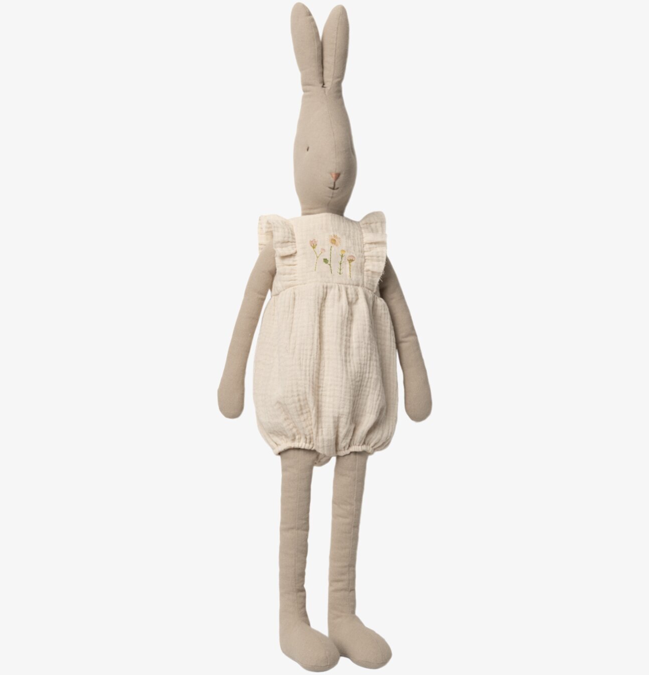 Bild av charmig mjuk kanin i jumpsuit med detaljer